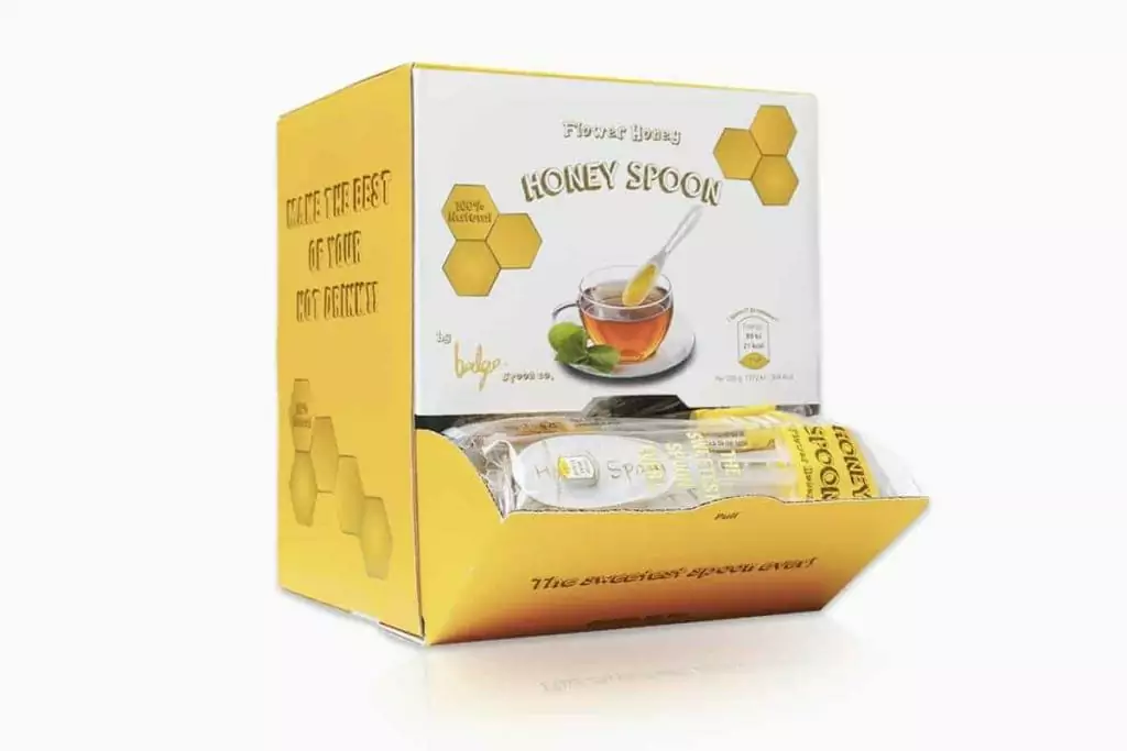 Coated spoons of honey
